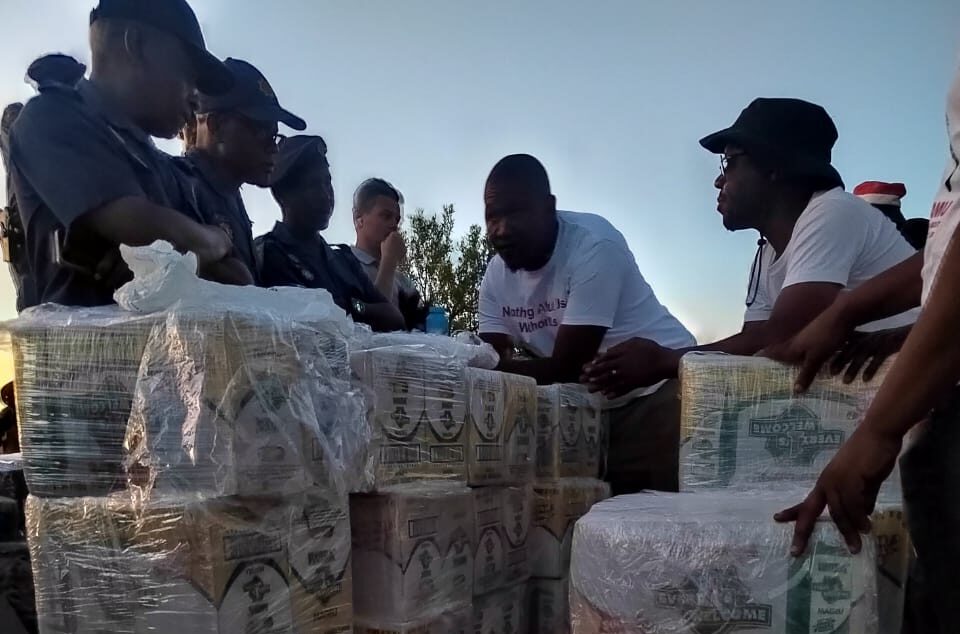 Residents send food and water to trapped illegal miners