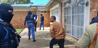 DNA evidence, dockets confiscated during raid at cop's home