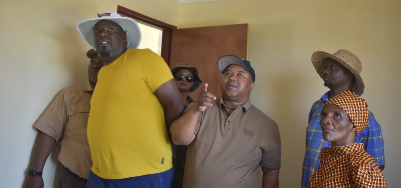 MEC of Cogta and human settlements Saki Mokoena alongside the new home owner and his team in one of the houses his department had handed over to beneficiaries in Namahadi Frankfort in Free State
