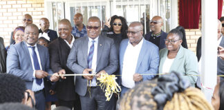 Premier Panyaza Lesufi with MECs Jacob Mamabolo, Matome Chiloane and Ekurhuleni Executive Mayor Nkosiphendule Xhakaza handing over the school.