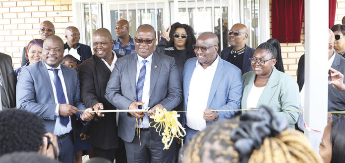 Premier Panyaza Lesufi with MECs Jacob Mamabolo, Matome Chiloane and Ekurhuleni Executive Mayor Nkosiphendule Xhakaza handing over the school.