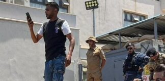 Libyans block off UN refugee office in protest against migrants