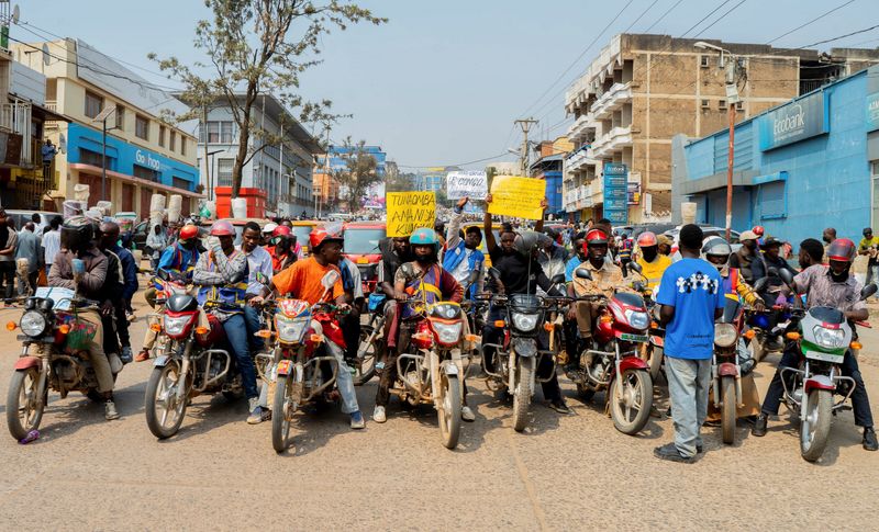 Congolese people demonstrating in Bukavu against constitutional reforms and calling for dialogue between the government and M23 rebels.