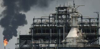 Flame rising from a gas flare at Dangote Industries oil refinery and fertilizer plant site in Lagos, Nigeria
