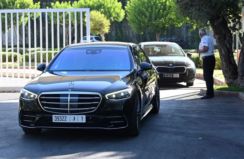 Cars leaving the FIFA office in Rabat, Morocco, where Gianni Infantino held a crisis meeting.