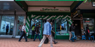Safaricom logo and mobile network setup driving Vodacom fintech growth
