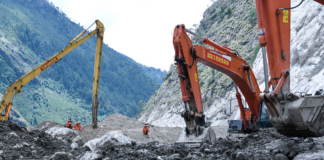 Heavy machinery operates in the hardest-hit area of Gyirong Port - southwest China's Xizang Autonomous Region.