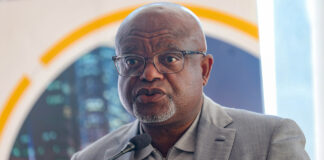 Johannesburg Executive Mayor Dada Morero speaking at the Honeydew Electricity Imbizo at Ruimsig Stadium